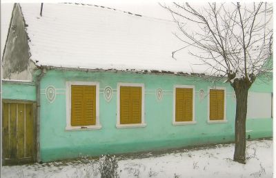 Vackert hus i mjuka färger. Ingen ovanlig syn.